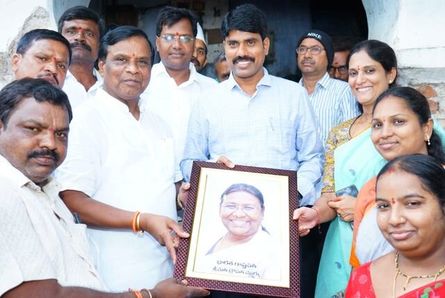 Dhanpal Suryanarayana presented the President's photo to the District Collector