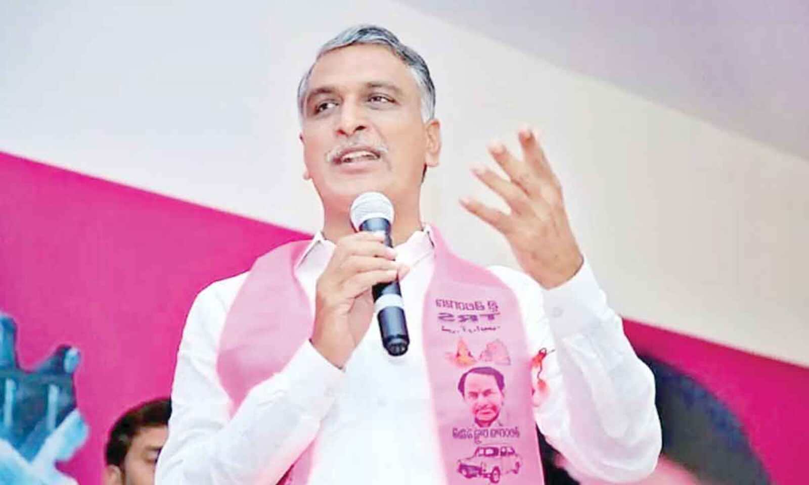 Pass books were distributed to the farmers in the hands of state finance and medical health minister Tanniru Harish Rao