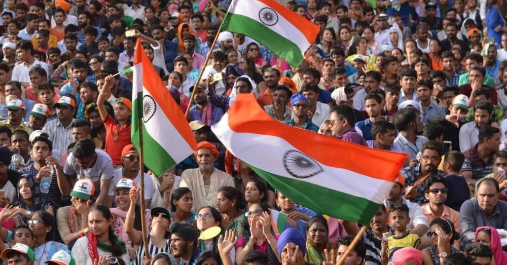 A lively Freedom Rally Tricolor flags fluttered all along the way