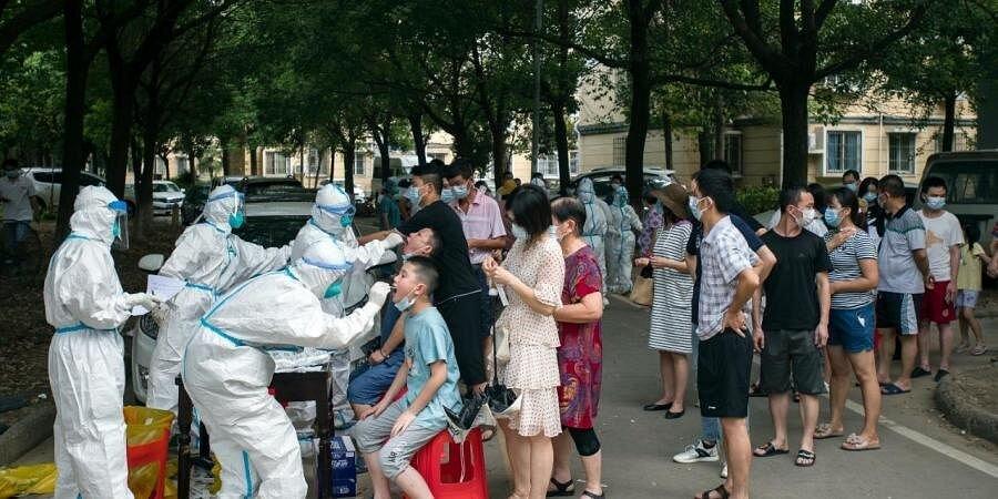 Residents under Covid lockdowns in China complain of food shortages