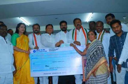 TPCC Chief Revanth Reddy Distributes Cheques to Families of Deceased Congress Cadre