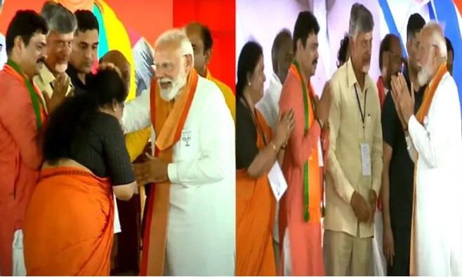 Prime Minister Narendra Modi blesses Kothapalli Geetha, BJP's candidate from Araku parliamentary constituency, at a public meeting at Anakapalli on Monday. TDP chief Chandrababu Naidu also participated.