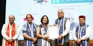 Vice President Jagdeep Dhankhar presents degree certificates to students at the convocation of KLE Academy of Higher Education and Research, Belagavi, Karnataka on Monday.