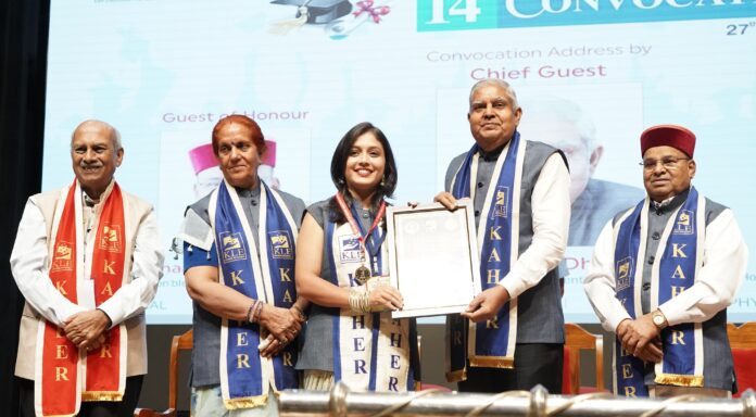 Vice President Jagdeep Dhankhar presents degree certificates to students at the convocation of KLE Academy of Higher Education and Research, Belagavi, Karnataka on Monday.