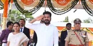 Telangana Chief Minister A. Revanth Reddy, flanked by Chief Secretary Shanti Kumari and DGP Ravi Gupta receives police salute at the Parade Ground in Secunderabad on Sunday.