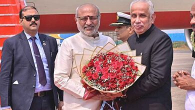 Governor Abdul Nazeer speaking at Andhra University centenary celebrations with faculty students and dignitaries present