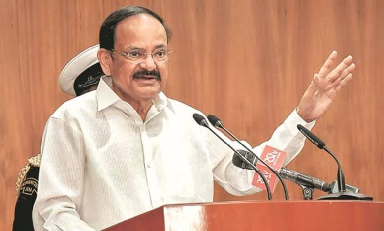 Venkaiah Naidu speaking at Andhra University centenary celebrations with dignitaries and students present