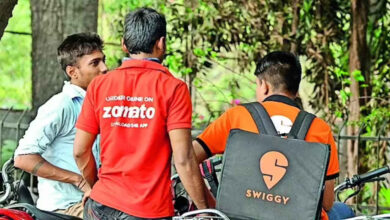 Gig worker receiving a glass of water during extreme Telangana summer heat while working outdoors