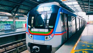 Crowded Hyderabad Metro train station with passengers boarding trains during increased services due to RTC strike