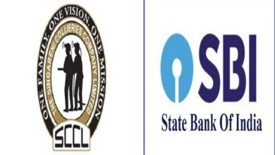 Singareni and SBI officials signing life insurance agreement for employees