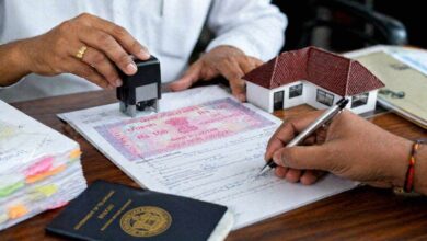Officials handling property registration documents and stamping papers as Telangana prepares to implement revised market values