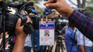 Telangana journalist accreditation card with camera media event scene