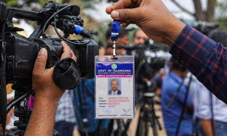 Telangana journalist accreditation card with camera media event scene