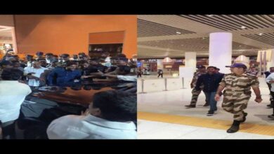 YS Jagan Mohan Reddy walking with security and greeting supporters at Bengaluru airport after returning from Europe tour
