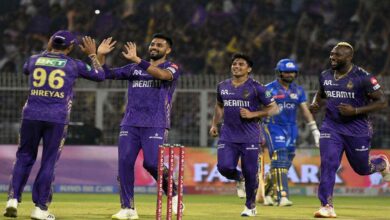 Kolkata Knight Riders celebrate an important victory over Mumbai Indians to stay alive in the playoff race