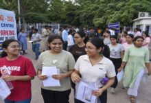 Students coming out of NEET UG exam centre in India after completing medical entrance test