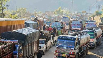 Heavy vehicles undergo load checking at national highway toll plaza under new toll rules