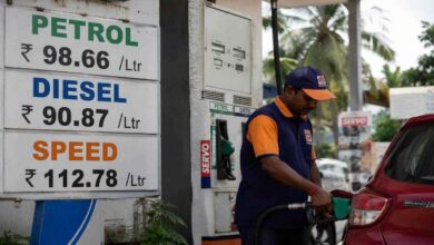 Fuel station worker filling petrol in a vehicle as petrol and diesel prices increase across India amid rising crude oil costs