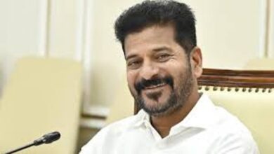 Telangana Chief Minister Revanth Reddy convoy moving through regular traffic in Hyderabad without stopping public vehicles