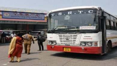 RTC buses at a busy bus station with passengers and staff during regular operations after the announcement of employee pay revision changes.