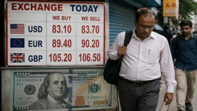 Currency exchange board showing dollar rates during the sharp fall of Indian rupee value in international markets.