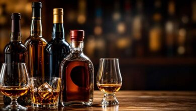 Liquor bottles and glasses representing Telangana liquor price hike impact
