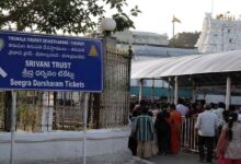 Devotees standing in queue near Srivani Trust ticket counter area at Tirumala amid investigation into online booking irregularities.
